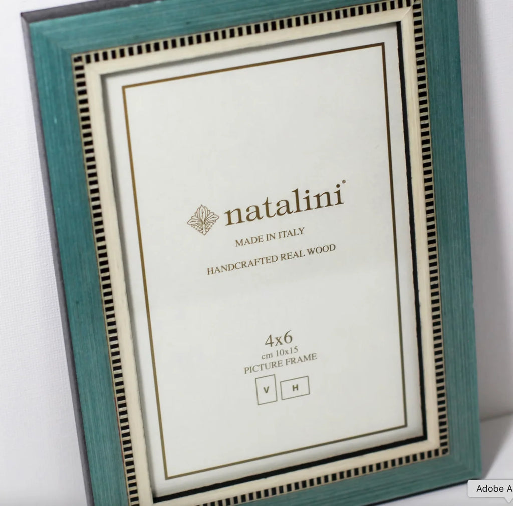 Teal picture frame with 'natalini' branding on a white background