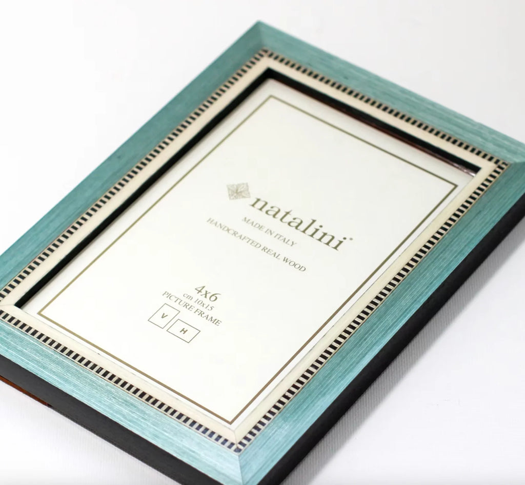 Teal picture frame with 'natalini' branding on a white background